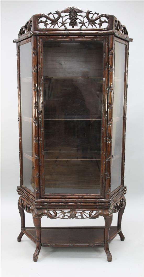 A Chinese glazed hongmu display cabinet, early 20th century, W.98cm D.40cm H.191cm